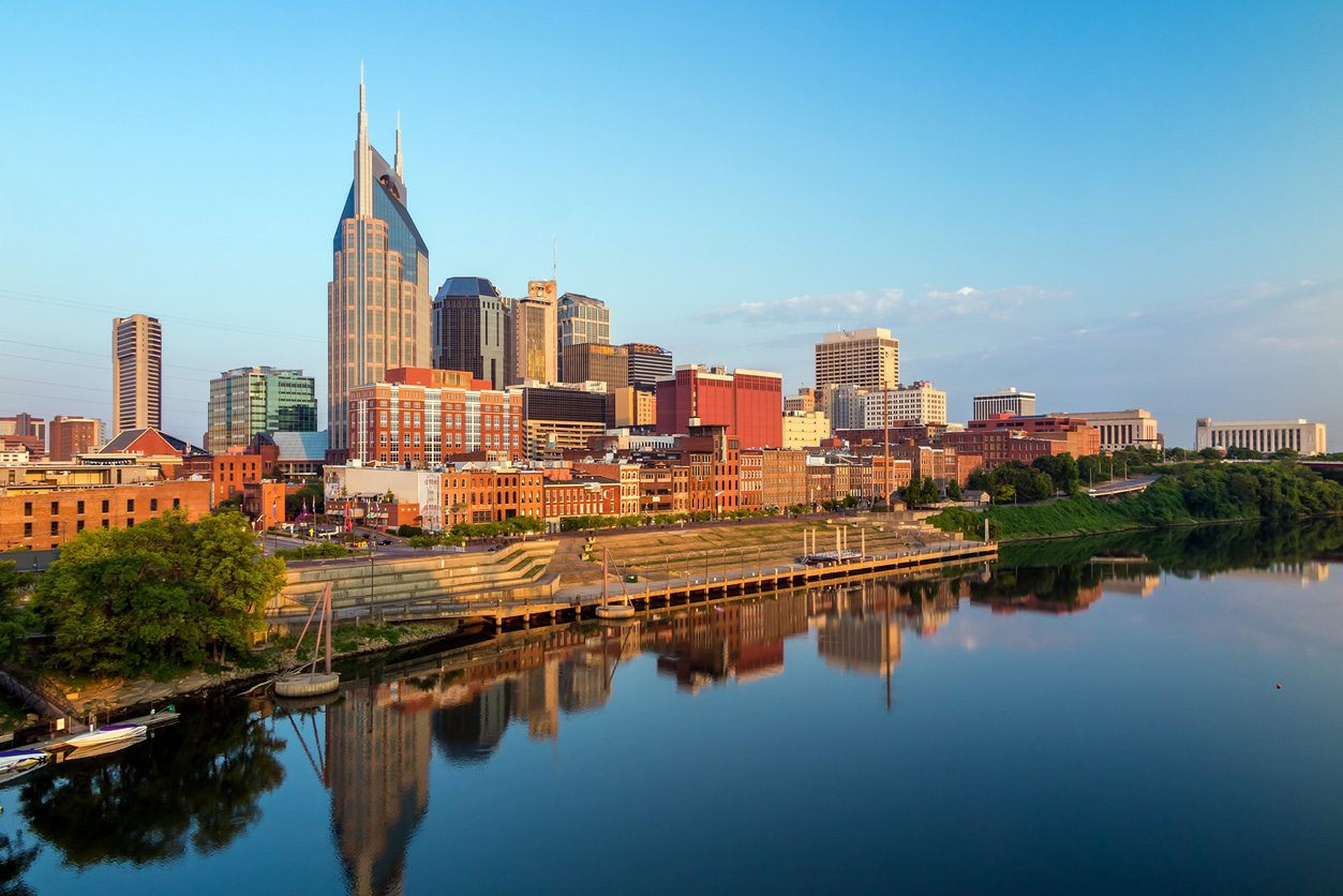 A view of the city skyline from across the river.